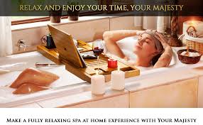 The bamboo caddy comes with an acrylic pump that can be used for dispensing your favorite soap or body wash. Amazon Com Premium Bathtub Tray The Longest Bamboo Bath Tray With Anti Slip Grips 1 2 Adults Expandable Bathtub Caddy With Wooden Book Holder Special Slots For Candles Wine Phone Gift Packaging Included Kitchen