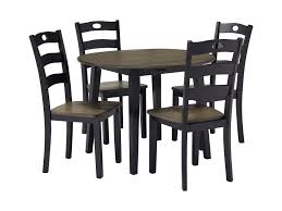 You can find several round dining table and chair sets on ebay that include glass in their design. Signature Design By Ashley Froshburg Two Tone Finish 5 Piece Round Drop Leaf Table Set Royal Furniture Dining 5 Piece Sets