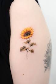 This person has got a small and delicate little sunflower. 50 Small Sunflower Tattoo Ideas