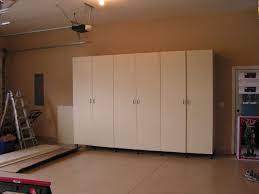 Remarkable Tall Garage Storage Cabinets With Doors From Medium Density Fiberboard Panels On Shaw Garage Storage Garage Storage Cabinets Large Storage Cabinets