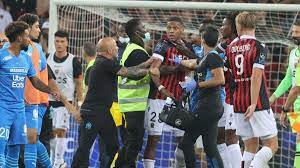 The french ligue 1 game between nice and marseille was abandoned sunday when fans of the home side invaded the pitch and angrily confronted opposing player dimitri payet, who had thrown a bottle. D6xkmqw6kqcokm