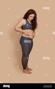 Fat belly looking down hi-res stock photography and images - Alamy