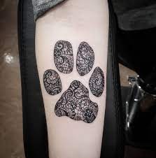 14 Beautiful Paw Print Tattoos That Might Just Convince You To Get Inked Rover Com Hand Tattoos For Girls Lace Tattoo Lace Shoulder Tattoo