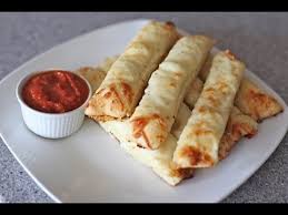 Basically, we're talking pizza dough with butter, cinnamon, and sugar and that clutch cinnamon roll ingredient, a gooey vanilla or cream cheese glaze. Homemade Breadsticks Using Leftover Pizza Dough Recipe Youtube