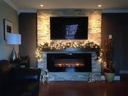 This cast stone mantel can be used around electric, gas or log burning fireplace inserts. Electric Fireplace With Mantel How To Find The Perfect One