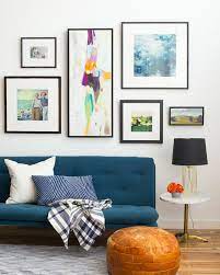 Often times, they have a much bigger design impact that an interior designer would like to admit. How To Choose Frame And Hang An Art Collection Gallery Wall Living Room Perfect Gallery Wall Gallery Wall