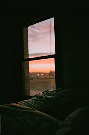 Sunrise Or Sunset Through An Apartment Bedroom Window Stocksy United Bedroom Photography Window Photography Bedroom Windows
