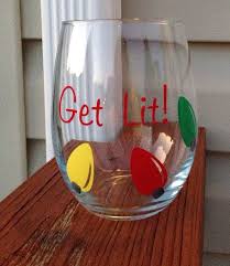Get Lit Fun Christmas Stemless Wine Glass On Etsy 12 00 Christmas Wine Glasses Vinyl Crafts Christmas Glasses