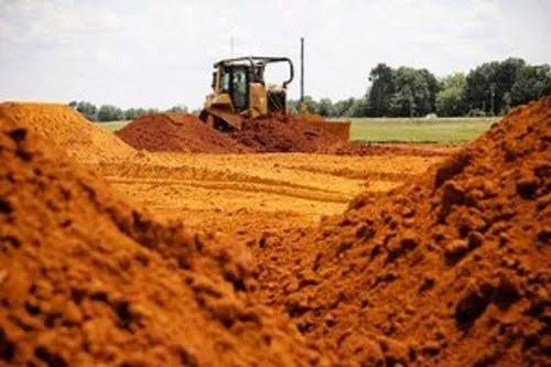 Soil filling service to raise low areas