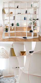 Dotée de quatre étagères et d'un tiroir. Bibliotheque Blanche 19 Etageres Au Design Immacule