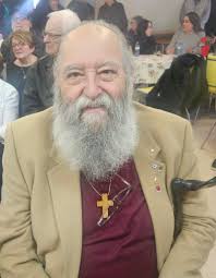 Sharon Lais receives the Bishop's Medal for dedication to St. Columba