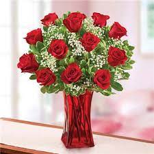 Bouquet of 18 red roses. 1 800 Flowers Blooming Love Premium Red Rose In Red Vase In Suffern Ny Petals And Stems Florist
