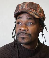 Pioneer Square denizen and sidewalk artist passes