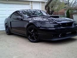 2002 Blacked Out Mustang The Headlights Might Be Taking It Too Far Maybe 2002 Ford Mustang Mustang Cars Mustang Shelby Cobra