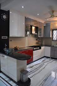 Countertop estimator · virtual kitchen · schedule an appointment U Shaped Kitchen With Modern Cabinets And Wall Decor By Prashant Mali Modular Kitchen Kitchen Interior Design Decor Interior Design Kitchen Kitchen Room Design