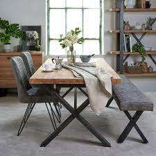 We designed this industrial dining table by drawing on manufacturing themes from the machine age of the early 1900s. Industrial Dining Table In 2021 Industrial Dining Table Wood Dining Table Modern Metal Wood Dining Table