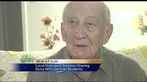 Holocaust survivor sharing story with students