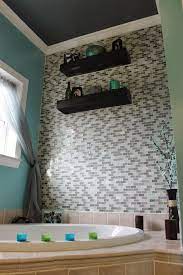 Glass tile bathroom glass subway tile accent tile bathroom glass tiles glass floor bathroom interior modern bathroom master bathroom beach these random glass brick mosaic tiles replicate the old fashioned brick wall structure, creating an intriguing contrast between the traditional and. Diy Glass Tile Accent Wall In Master Bathroom Tile Accent Wall Glass Tile Accent Wall Glass Tile Accent