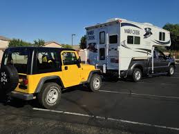 If your jeep is equipped with an automatic transmission, then press and hold the brake pedal and shift the transmission into neutral. 6 Easy Steps To Flat Tow A Jeep Wrangler Truck Camper Adventure