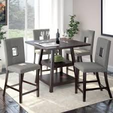 We have been providing excellent customer service, selection and quality to each we sell furniture made by ashley, american eagle, stanley, home line, broyhill, global, acme and home elegance just to name a few. Baxton Studio Broxburn Vintage Industrial 5 Piece Medium Brown Wood Pub Set 6051 6053 Hd The Home Depot Round Dining Room Sets Dining Room Sets Counter Height Dining Sets