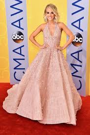 The couple had dated each other after they met at one of the concerts in late 2008, and got engaged in december 2009. Cma Awards 2016 All Of Carrie Underwood S Outfit Changes Billboard Billboard