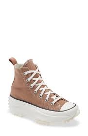 Traditional vulcanized sole toughness, abrasion resistance and thermal stability. Brown Converse Nordstrom