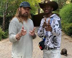 Old town road blew up on the social media network tiktok and became fodder for memes all across the internet before it hit billboard's country the sample of the song was not initially cleared to appear on beatstars or later in old town road. nine inch nails didn't respond to rolling stone's. How Did Billy Ray Cyrus Get On Old Town Road Remix Lil Nas X 26 Facts About Popbuzz