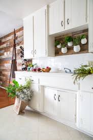 Applying beeswax, a natural product is an old world method of adding shine to wood products, including kitchen cabinets. Cleaning Kitchen Cabinets How To Clean Wood Painted Cabinets The Best Way Apartment Therapy