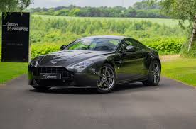 Image result for Marron Black 2017 Aston Martin