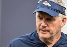 Coach Vrabel Running with Players and Myles Garrett