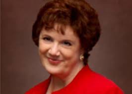 Images of longtime Daytona Beach business leader Sandy Burke Bishop