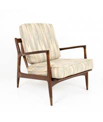 This chair is an heirloom piece. Kofod Larsen For Selig Mid Century Danish Walnut Lounge Chair