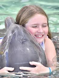 Ringing in double digits for Mae with a Bahama cruise! We got to hug a  dolphin and eat unlimited icecream with our best friends! Nothing better!!  So thankful for this amazing opportunity