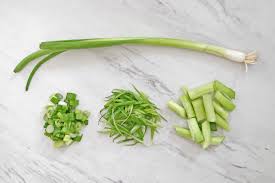 You can read more about the distinction between green onions and bulbing onion in our article onions vs. How To Cut Green Onions Scallions Clean Green Simple