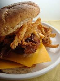 Bobby Flay S Cheyenne Burger With Bacon Cheddar Bbq Sauce And Shoestring Onion Strings Beef Recipes Recipes Food Network Recipes