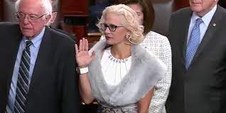 The latest tweets from @kyrstensinema Kyrsten Sinema Wears A Pink Coat And Fur Stole For Senate Swear In