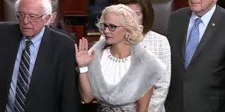 The latest tweets from @kyrstensinema Kyrsten Sinema Wears A Pink Coat And Fur Stole For Senate Swear In