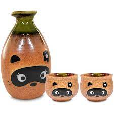 Amazon.com | Mino Ware Traditional Japanese Sake Set, Tokkuri Bottle and 2  Ochoko Cups, Boy Bottle & Girl Cups Tanuki Japanese Racoon Dog Design: Sake  Sets