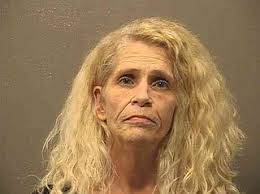 Woman is charged in animal cruelty