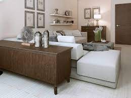Installing shelves on the wall behind the couch is a fantastic way to make use of the available space and provide a support for some decoration. Are Sofa Tables Out Of Style In 2021 And Beyond Furnishing Tips Home Furniture Decor Guide Ideas Tips