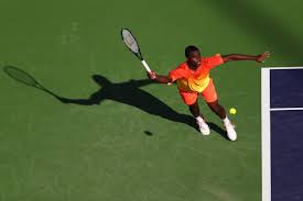 And considering the age gap, there is a distinct. Tennis Pro Frances Tiafoe Playing Roger Federer Being Top 100 Rolling Stone