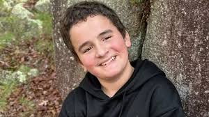 Michigan Mom miraculously wakes up from 5 year coma to attend son's  football game