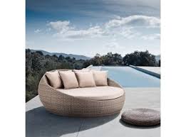 With 2 ottomans blending into the shape of the sofa, you have the option of putting your feet up and relaxing your legs or using them as chairs for more guests. Large Newport Round Outdoor Wicker Daybed Without Canopy Outdoor Daybed Outdoor Wicker Daybed