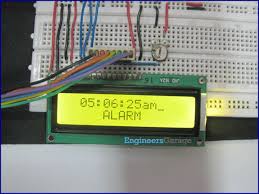 Lcd Based Digital Alarm Clock Using 8051 Microcontroller At89c51 Circuit On Breadboard Microcontrollers Digital Alarm Clock Alarm Clock