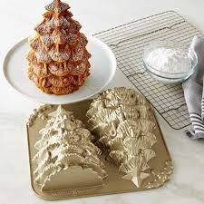 Like any bundt pan, this christmas tree bundt pan will make any plain cake look suddenly merry and festive. Nordic Ware Tree Cake Pan Williams Sonoma