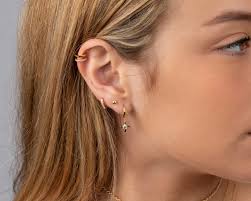 Hugging Hoop Earrings With Dangling Cross Charm and Cz