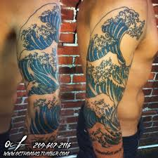 Get a glowing wave tattoo etched on your arm. Sartle Blog Think Before You Ink The Great Wave Off Kanagawa