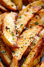 Crispy Garlic Baked Potato Wedges Cafe Delites In 2020 Potato Wedges Baked Wedges Recipe Garlic Baked Potatoes