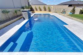 A backyard retreat in dallas, texas that features a wonderful outdoor living area and luxury swimming pool. Swimming Pool Water Features Water Walls Bubblers And More