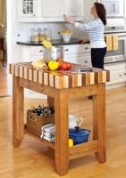 How we created our diy kitchen island with prefab cabinets, a little trim, and unfinished butcher block countertops for an upscale custom look. Kitchen Islands Woodworkersworkshop